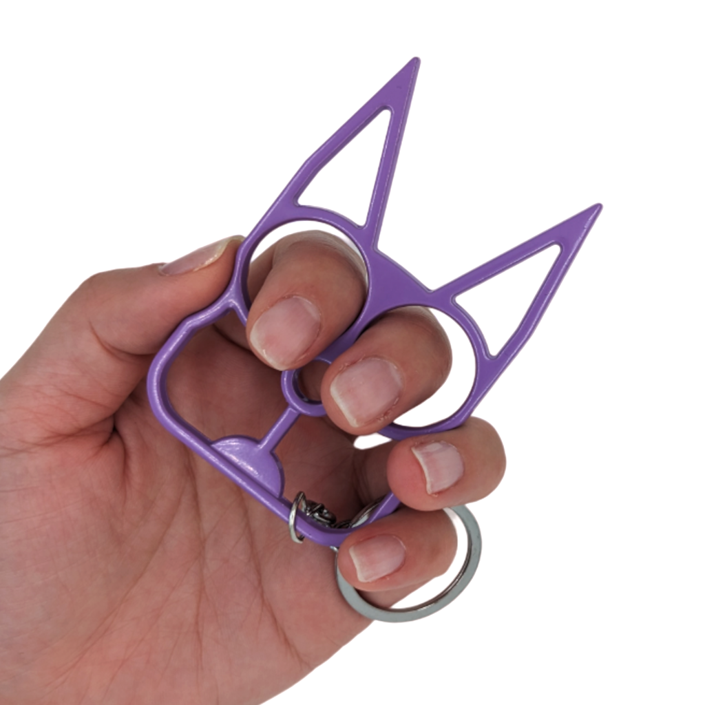 Lavender Cat Ears Self Defense Knuckles Keychain Held By Model