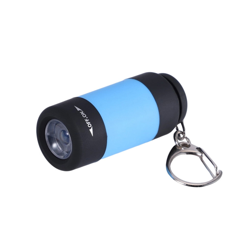 Light Blue Mini Torch LED Flashlight Safety Keychain on White