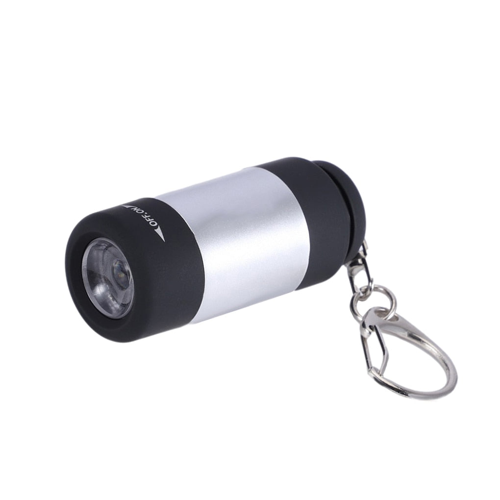 Silver Mini Torch LED Flashlight Safety Keychain on White