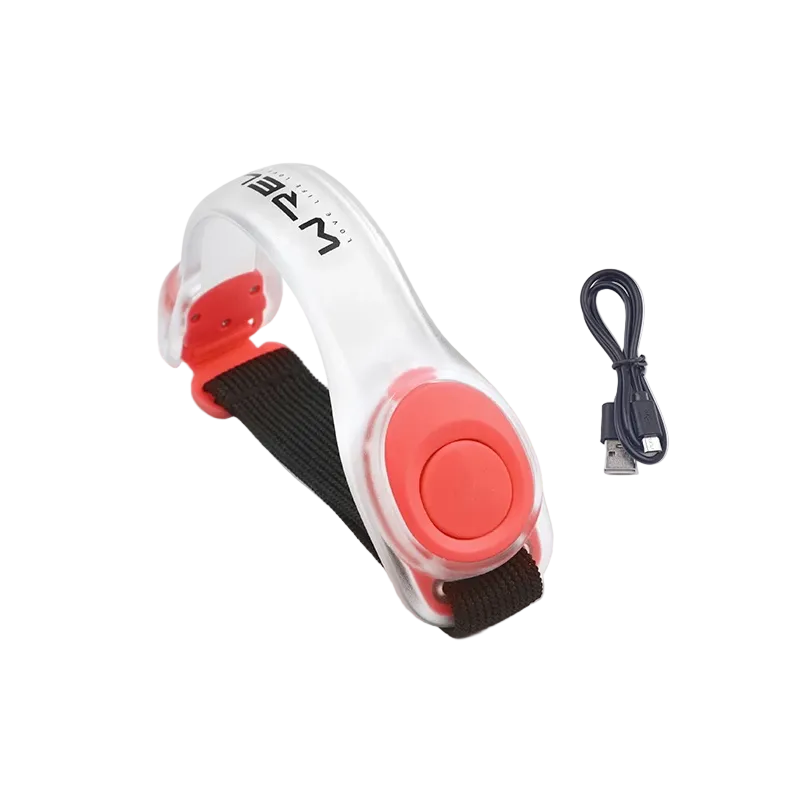Red LED light-up armband for runner safety and a USB cable on a white background