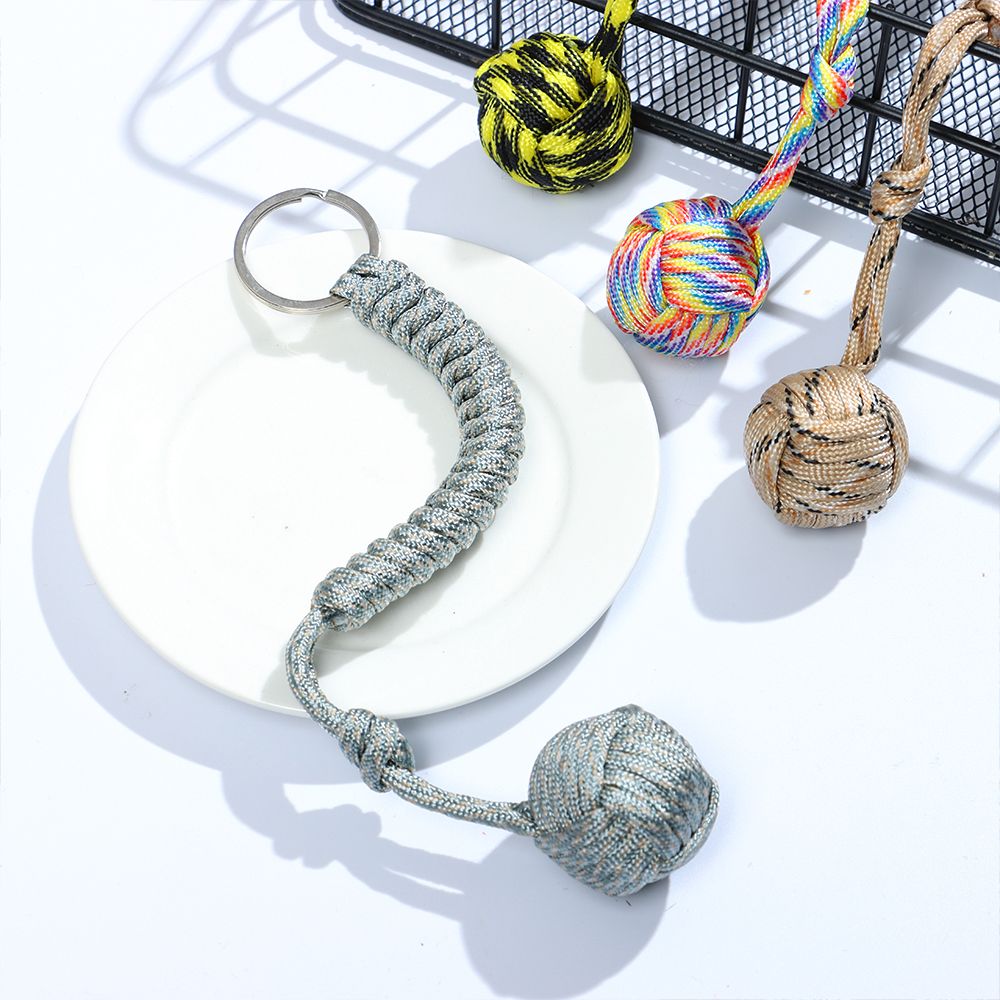 Defense Ball keychain steel sphere of self-defense and survival covered  with gray color rope